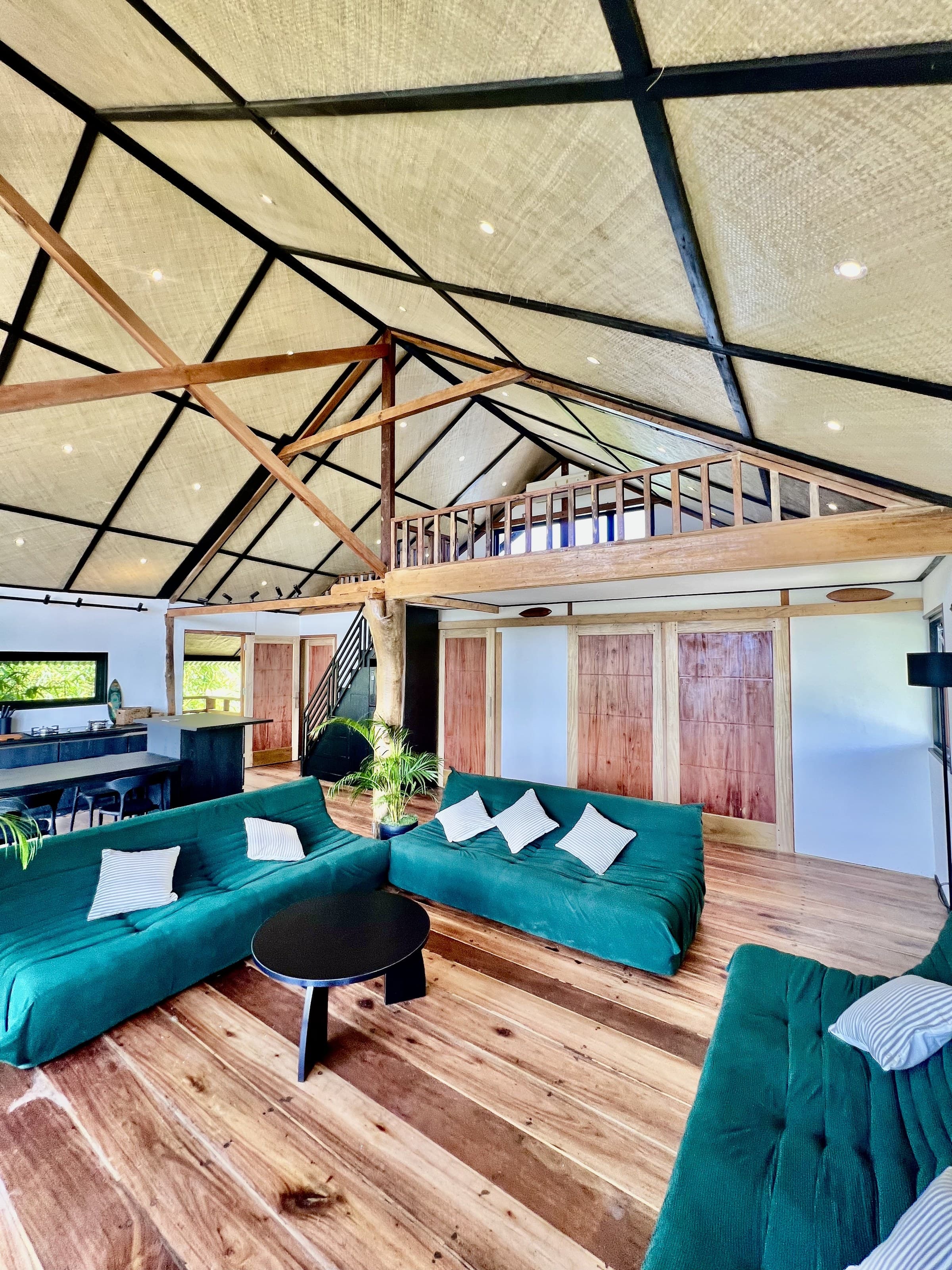 Inside the beachfront loft, the mezzanine above the open living space