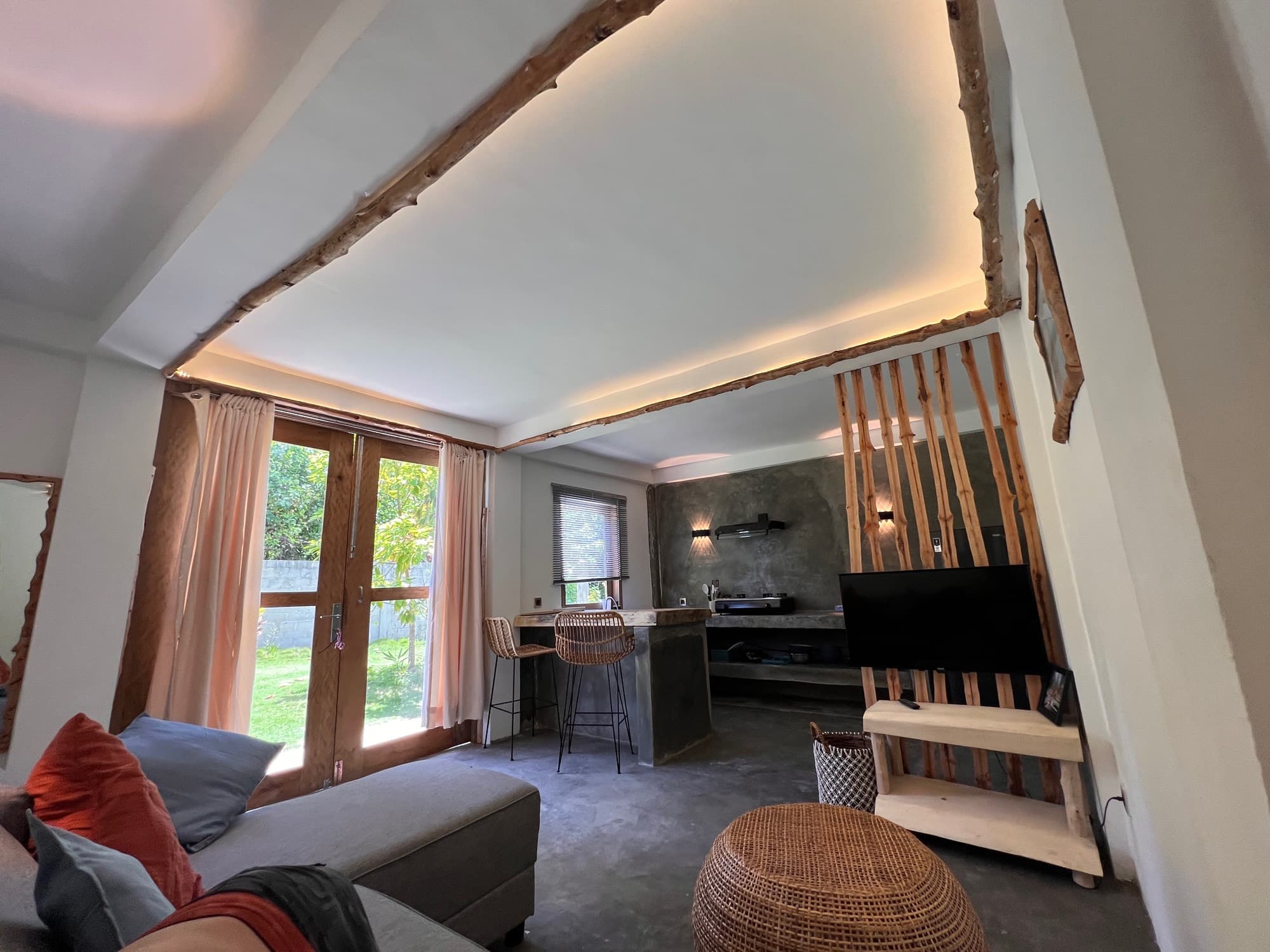 The studio’s living area, opening onto the garden