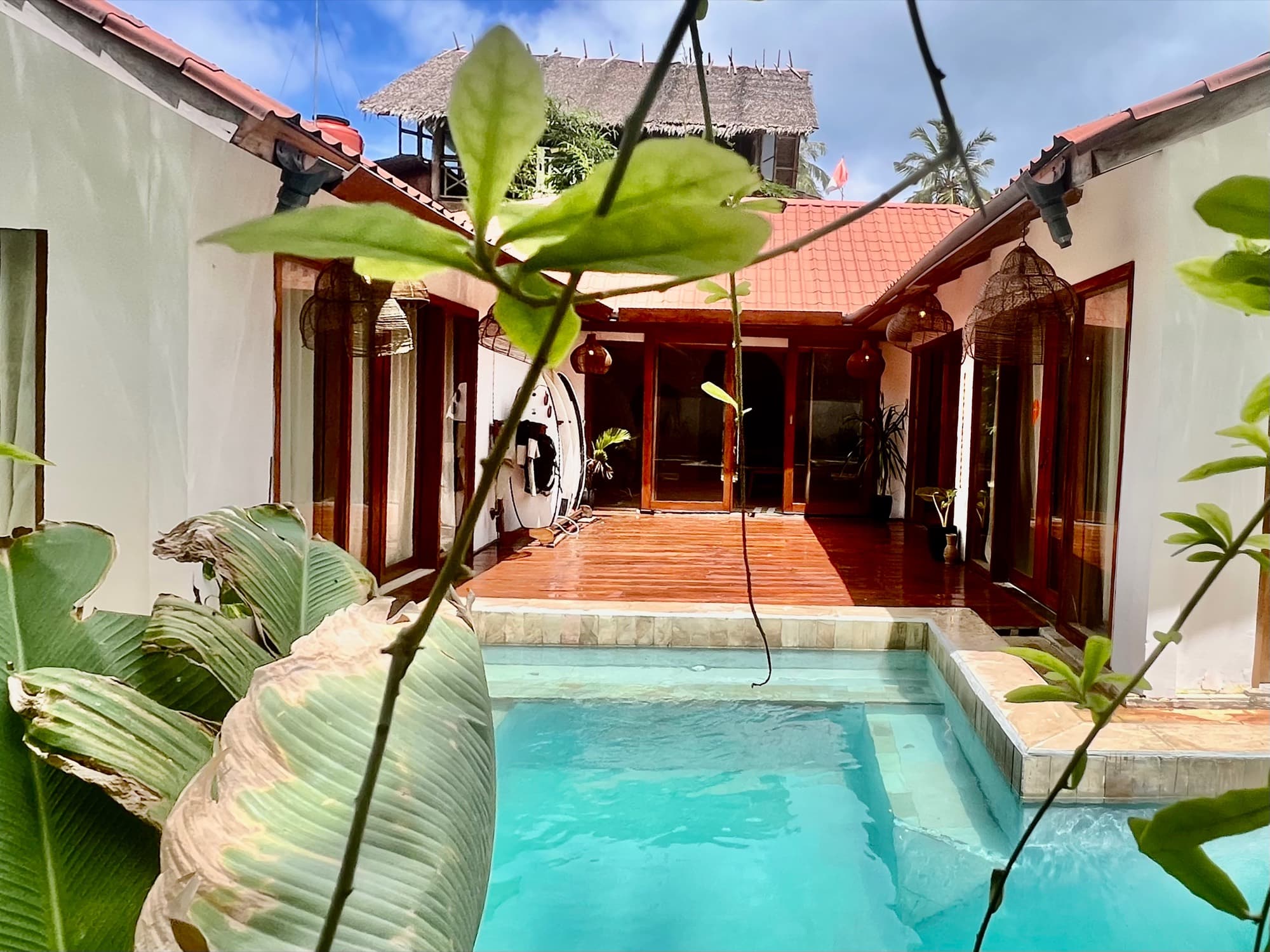 The pool looking back at the villa and its open living room